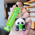 Close-up of 3D panda keychain with green Panda Baby wrist strap and bamboo detail - Gen 1 Holding Bamboo Shoot