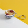 Miniature blue floral bowl keychain featuring realistic millet and red jujube porridge - No.8 Red Date Millet Porridge (Model)