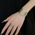 Minimalist gold lattice pattern cuff bracelet and ring set for women in metallic finish - 65# Feather Hollow Glossy Two-Piece Set / Silver
