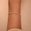 Elegant 18K gold plated stainless steel bead bracelet worn on wrist for a minimalist style - Beaded Bracelet
