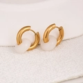 Golden hoop earrings with translucent white jade-style pendants in a modern design - White Jade