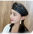 Stylish black PU leather baker boy hat with a gold metal V-logo buckle for women - One Size 58cm / Black V Logo Style