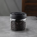 Vacuum sealed borosilicate glass jar with black lid filled with fresh coffee beans - 500ml / Transparent Bottle / Black