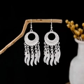 Silver bohemian tassel earrings with hollow circle and leaf-shaped metal pendants - Silver Round Feather Style(E5819)