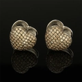 Sparkling silver heart stud earrings with champagne zircon stones on black reflection - Heart / Silver Champagne Zircon