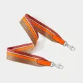 Detailed view of the wide woven strap with orange leather ends and silver metal clips - Standard Type / Orange Silver Buckle