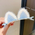 Blue and white plush cat ear hair clip for girls with soft fuzzy texture and cute design - Blue