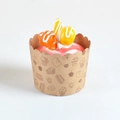 Realistic artificial cupcake model with brown pastry cup and red fruit topping - Walnut Mango