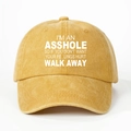 Close-up of mustard yellow washed cotton baseball cap with white slogan text print - Yellow