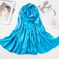 Detail of the soft blue matte satin silk bawal scarf with an elegant glossy texture - 180*70cm / Blue