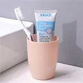 Vaso para cepillo de dientes minimalista en plástico rosa claro con acabado mate - Bolsa OPP Individual / Beige