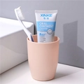 Minimalist light pink plastic toothbrush cup with matte finish and rounded conical shape - Individual OPP Bag / Beige