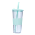 Close-up detail of the transparent double-wall plastic tumbler with mint green silicone sleeve and straw. - 24oz / Light Green