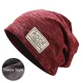 Detail view of burgundy knitted beanie with ROCK patch and warm fleece lining texture - Fleece Lined Autumn Winter Style / Burgundy