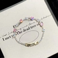 Detail of gold tennis bracelet with pink square stones and white cubic zirconia accents - 40# Gold Pink Square Style
