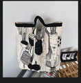 Minimalist canvas tote bag with black vegetable line art illustrations on cream fabric - Off-white Radish