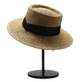 Detail of hand-woven straw texture and black grosgrain ribbon on the flat top boater hat - Khaki + Black Ribbon