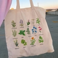 Beige canvas tote bag with retro herbal floral print and plant names illustration - STD874-F Botanical Encyclopedia