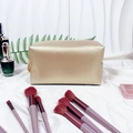 Elegant golden rectangle makeup bag with pearl letter detail and crosshatch texture - Medium / Gold