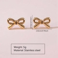 Detail view of golden stainless steel bow earrings with precise size and weight specs - Stainless Steel Polished Bow Studs
