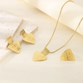 Detailed view of 18K gold plated jewelry set with geometric hammered texture on fabric - Geometric Hammered Triangle Style (KS220716-LX)