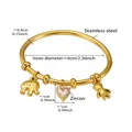 Detail showing dimensions of 18k gold plated stainless steel bangle with cute charms - Gold Elephant Bear Zircon Bangle