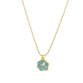 Gold beaded necklace with a blue enamel irregular round pendant featuring a whale tail - Bead Chain Style