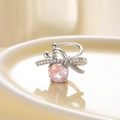 Silver bow clip-on earring with pink millennium rose cut zircon on ceramic plate - Left Ear / Pink (Peach)
