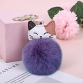 Cute calico cat keychain with a purple faux fur pompom and golden metal clip - Taro Purple