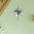 Silver star-shaped birthday candle with metallic finish on light green background - Pentagram / Silver