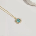Golden evil eye sun pendant necklace with blue resin eye and white zircon inlays - Multilayer Evil Eye