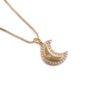 Gold plated star and moon pendant necklace with cubic zirconia on white background - Circular Star Moon