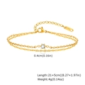 Detail of double-layer gold stainless steel anklet with cubic zirconia and lobster clasp - Double Layer Anklet / Gold