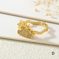 Detail of 18K gold-plated open ring with sun and zircon-pave cloud on a wavy band - Gold Sun and Cloud