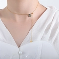 Vintage gold necklace with black rose pendant and diamond accents on a model - 44+5cm / Gold