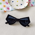Women's butterfly cat eye sunglasses with unique black geometric frames and dark lenses - Black