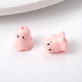 Close-up of pink ghost acrylic charms for DIY jewelry and phone chain accessories - 17*15mm / Pink