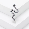 Detail of silver snake brooch with sparkling purple and blue rhinestones on white cubes - Full Rhinestone Patterned Snake