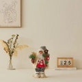 Standing Santa Claus figurine in red snowflake sweater holding skis and birdhouse. - Red Polka Dot / 30cm Height