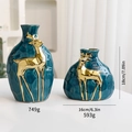 Set of 2 teal ceramic Christmas vases with gold reindeer relief and geometric textures - Blue Reindeer Small And Large