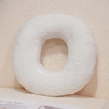 Plush white round doughnut throw pillow made of soft boucle fabric for home decor - Letter O