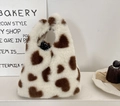 Détail du sac à main en peluche à motif cœur montrant la texture et la doublure - Coeurs Blancs