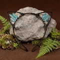 Detail showing blue crystal clusters and small beads on black cat ear headband - Sea Blue Cat Ears