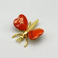 Golden butterfly brooch with heart-shaped red jasper wings and polished finish - Red Jasper