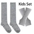 Macro detail of grey ribbed knit textures on children's long socks and arm warmers set - Solid Light Grey