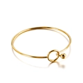 Minimalist golden stainless steel bangle with a spherical pendant on white background - Gold Color Bracelet