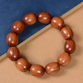 Bracelet en bois de Huanghuali poli avec 12 perles ovales au grain naturel - Style Ovale en Forme de Datte (20mm)