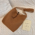Detail of plush brown tote bag with gingham lining and decorative leather drawstring - Brown