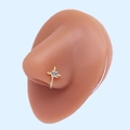 Detailed close-up of golden cross nose stud with square zircon on silicone model - Gold Cross White Square Zirconia (#10)