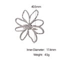 Macro detail of silver floral ring dimensions showing 40.5mm outer and 17.4mm inner diameter - Steel